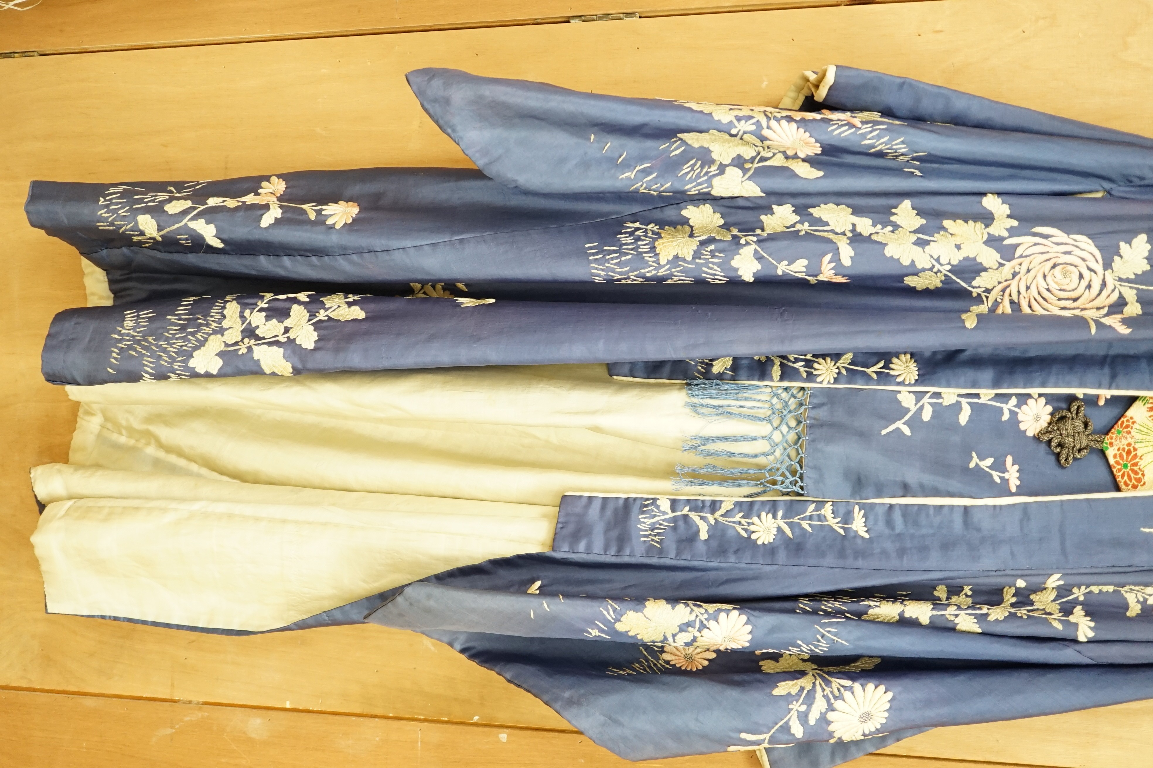 A Japanese embroidered silk kimono and a brocade obi